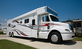 A class A RV parked at motorhome campground